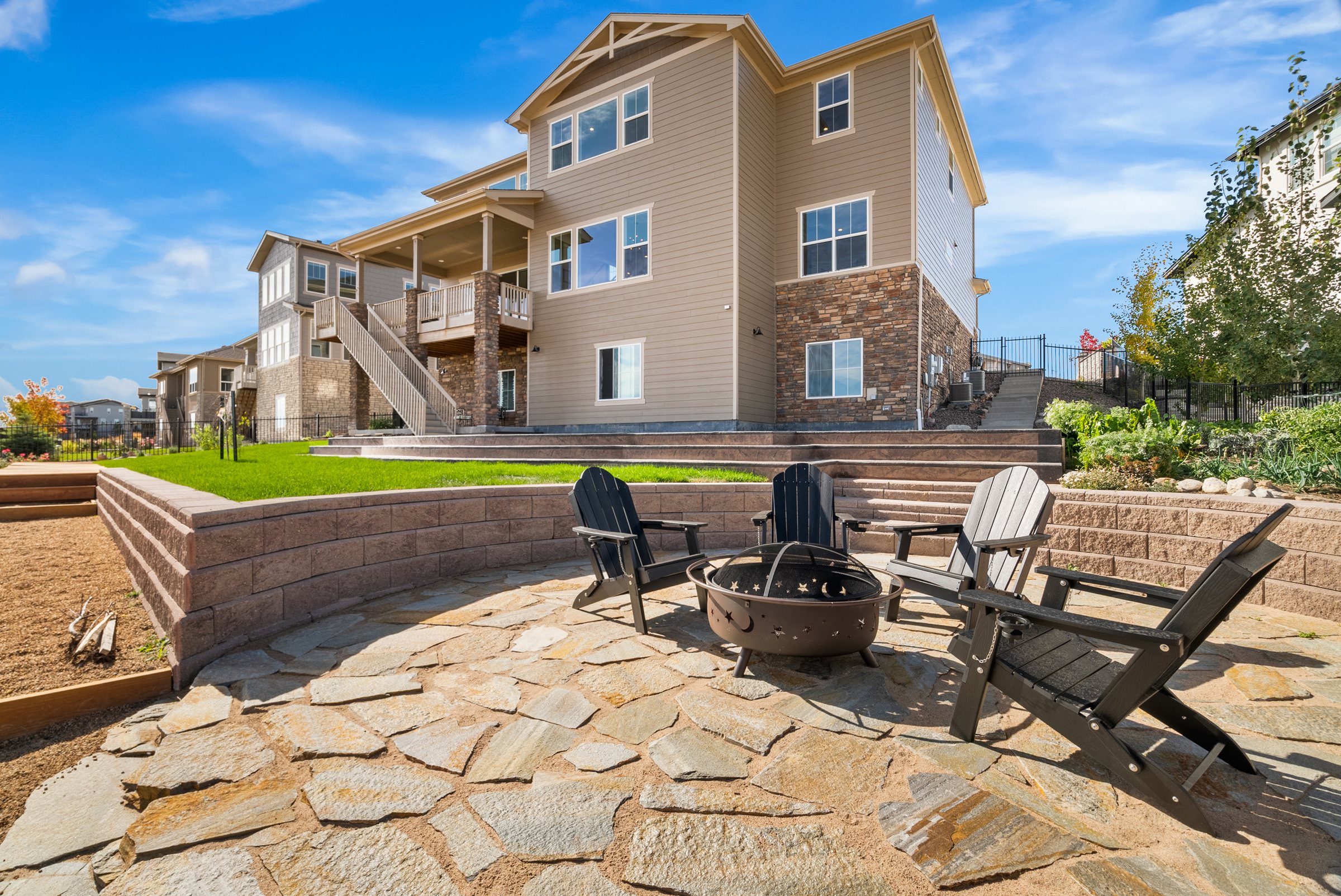 Fire-pit patio below the rear deck.