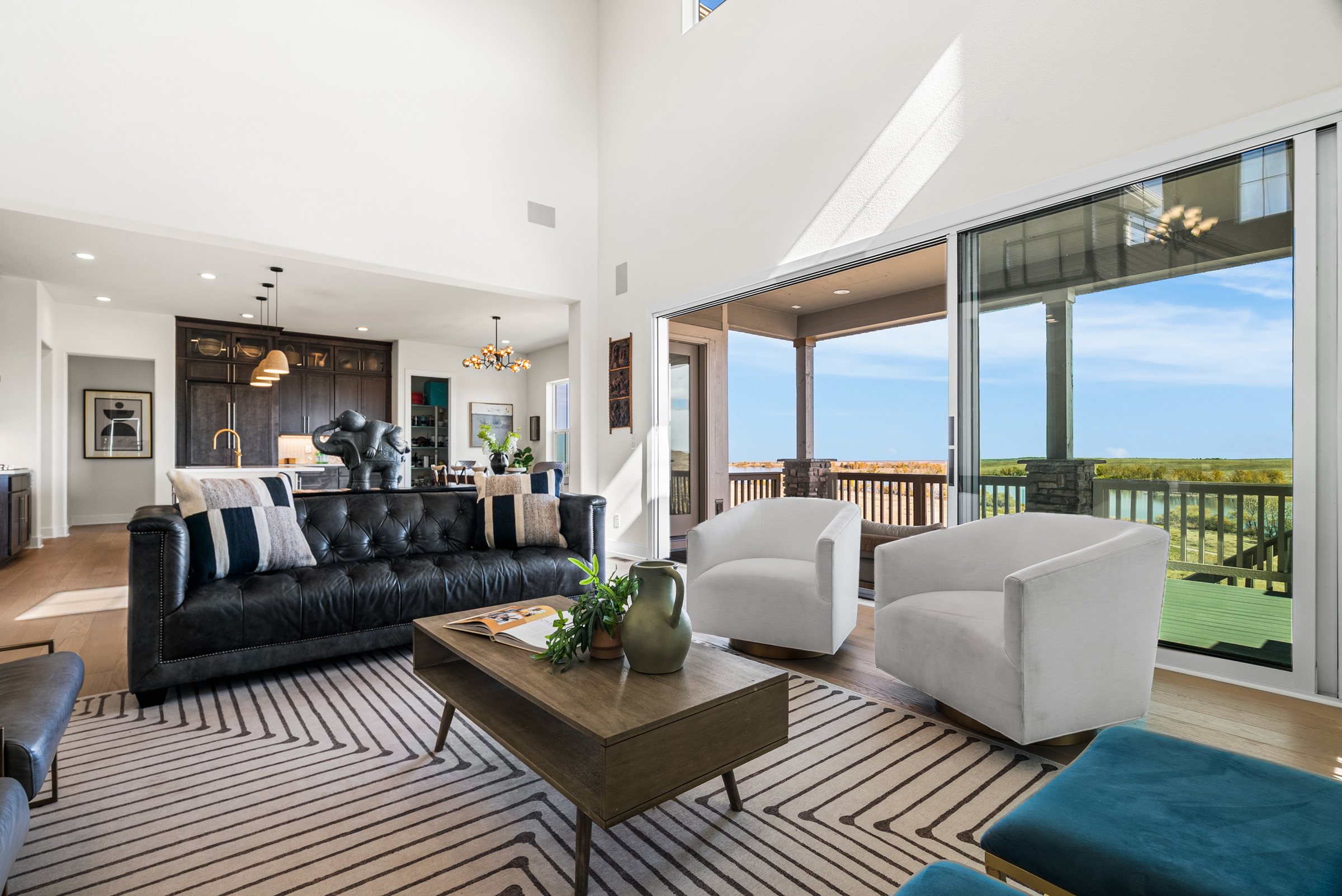 Indoor-outdoor great room opening to the covered deck.